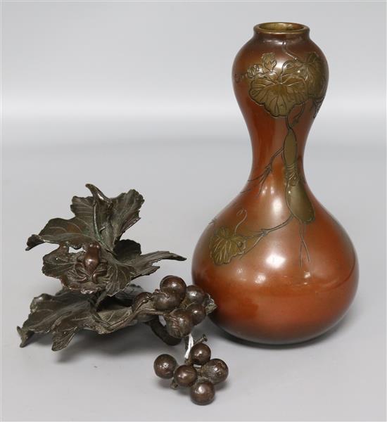 Japanese bronze leaf and grape sculpture with frog and a foliate incised double gourd vase, signed